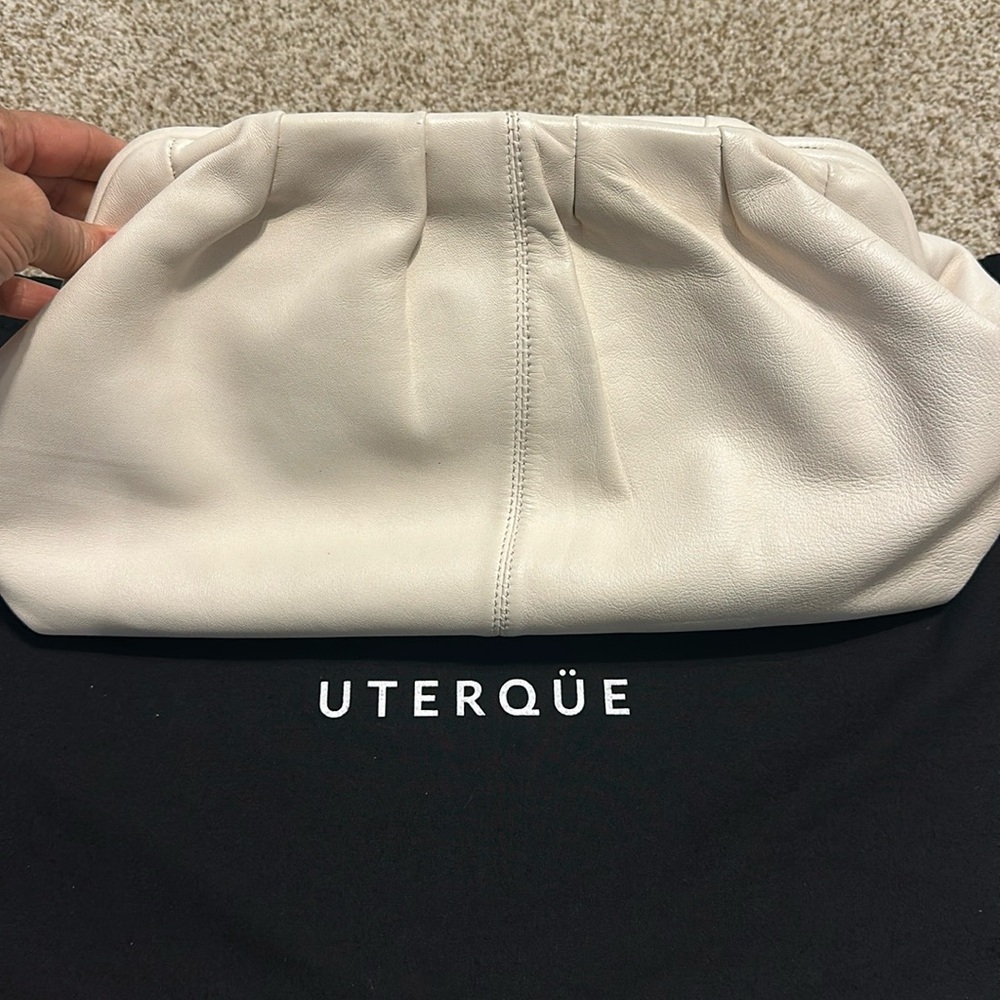 Brand: Uterque
soft and slouchy leather large clutch bag .